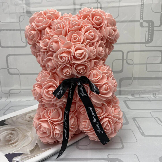 beautiful rose flower with teddy bear